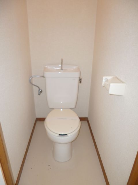 Toilet. Clean restroom.