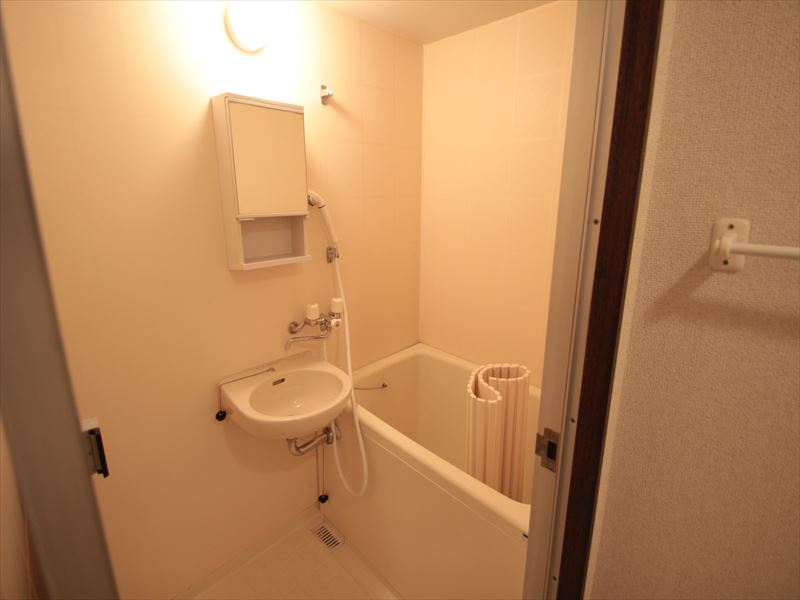 Bath. It is a toilet and another