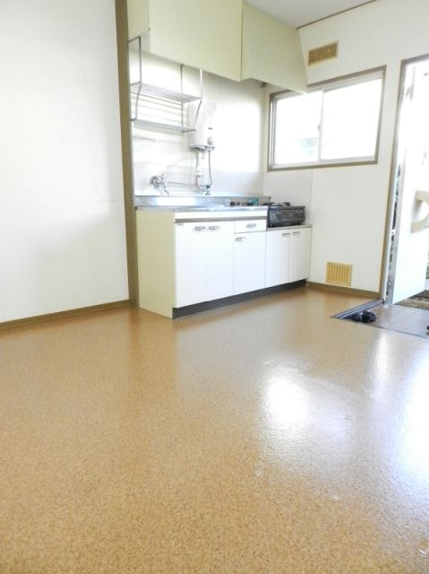 Living and room. It is the spread of dining kitchen