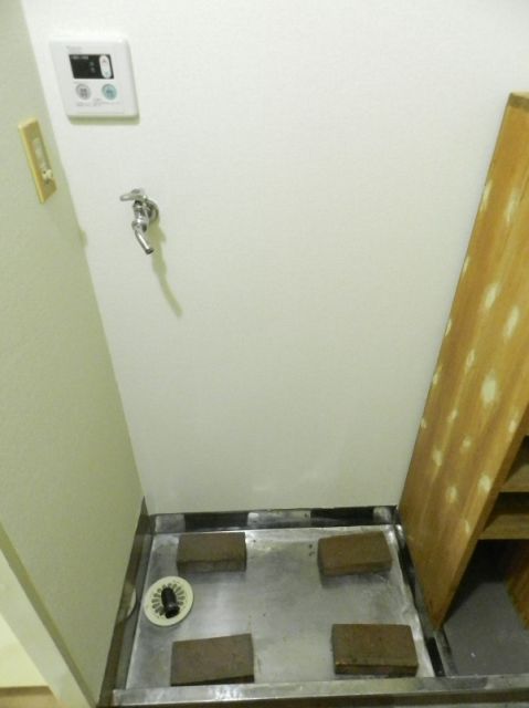 Other Equipment. Washing machine in the room