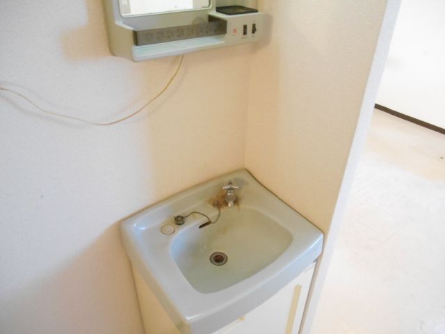 Washroom. It is with wash basin.