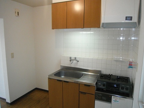 Kitchen. Also put in a room refrigerator