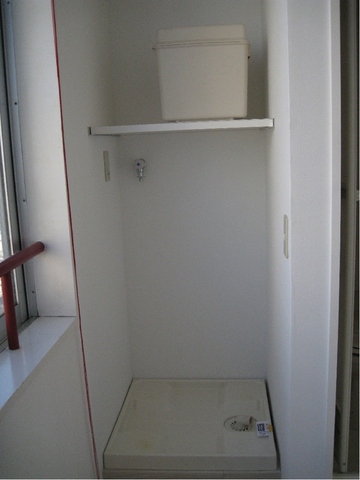 Other Equipment. Washing machine in the room