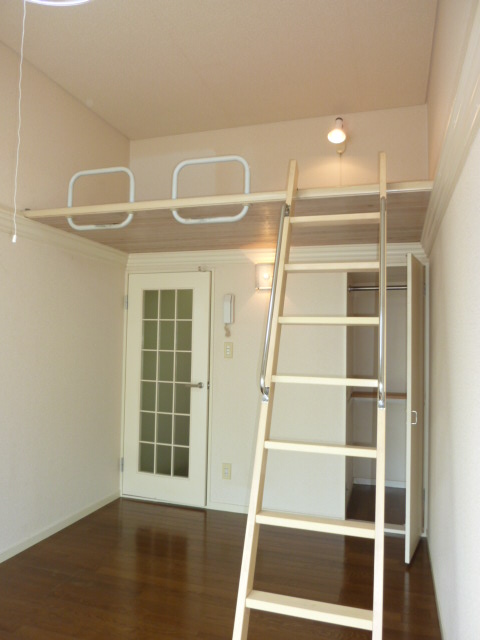 Living and room. The ceiling is high with loft