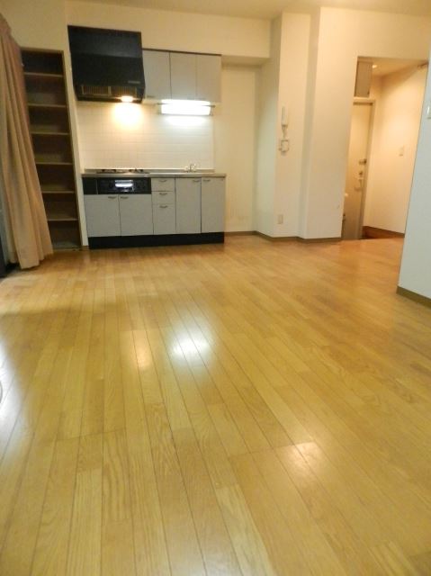 Living and room. All is the flooring of the room