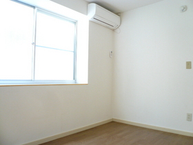 Living and room. South-facing bay window there is a room of