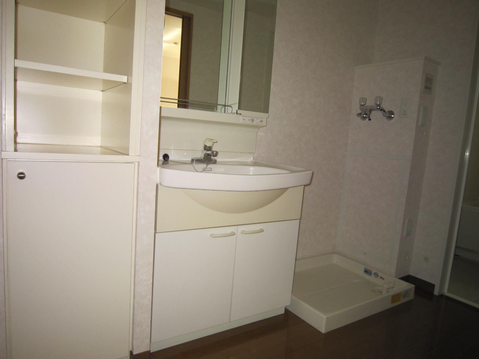 Washroom. Vanity of hot water Available