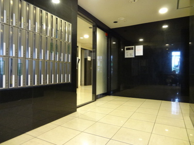 lobby. auto lock, Entrance with a security camera