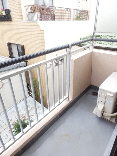 Balcony. Laundry is Jose with a veranda