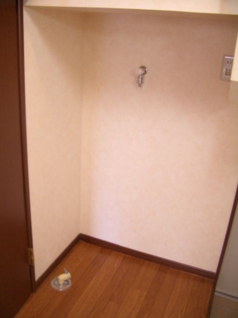 Other Equipment. Washing machine in the room