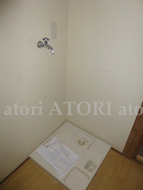 Other Equipment. Washing machine in the room