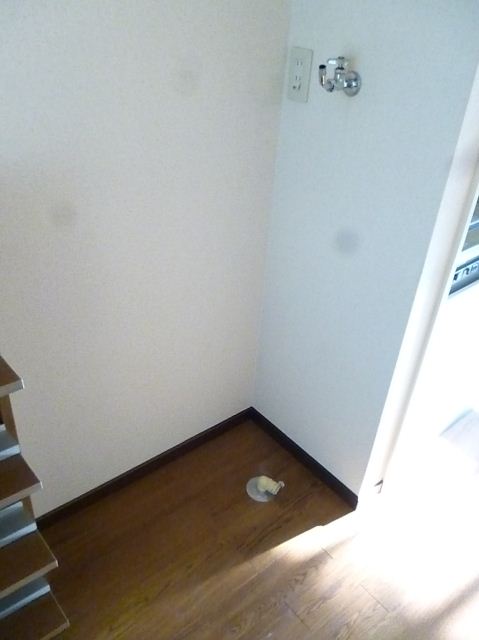 Other. Washing machine is put in a room. 