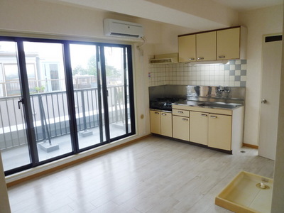 Living and room. The window is large open