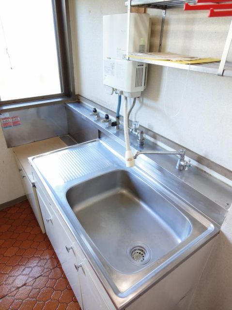 Kitchen. It is bright and there is a window