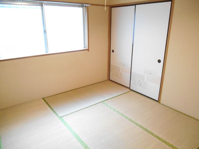 Living and room. With a closet in the room