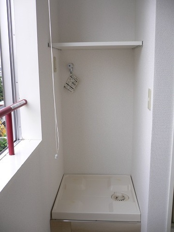 Other Equipment. Washing machine in the room