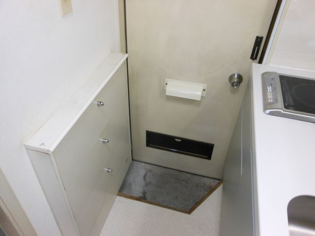 Entrance. Entrance neat dated cupboard