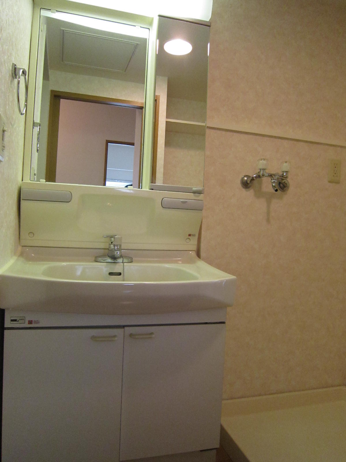 Washroom. Hot water Available Laundry Area next to