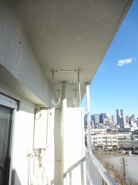Balcony. Also it comes with a hook for laundry.