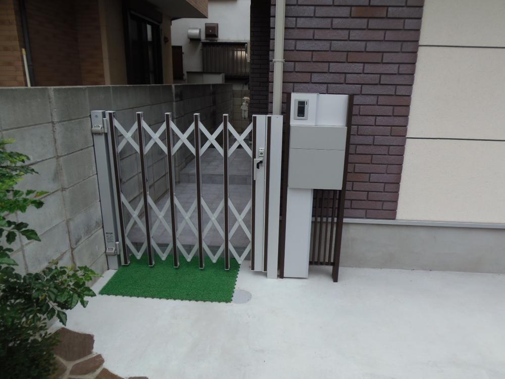 Other. Gate is standard equipment in front of the entrance, It prevents suspicious person of intrusion.