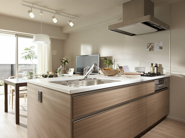 Kitchen.  [kitchen] The adoption of the Peninsula Kitchen, Rather than separate the space, By gradually connecting, While that of another family each, It has achieved a space that is wrapped in the peace of mind that "being together.".