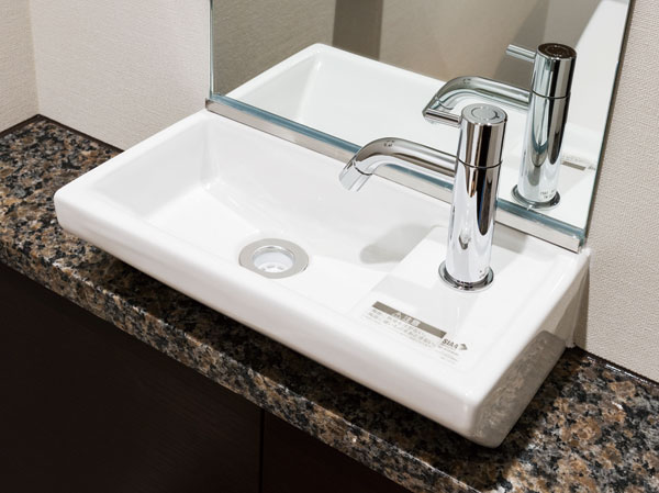 Bathing-wash room.  [Natural stone hand-wash counter] Adopt a pottery bowl in natural stone counters. Stylish specification, To keep the aesthetics of the toilet space.