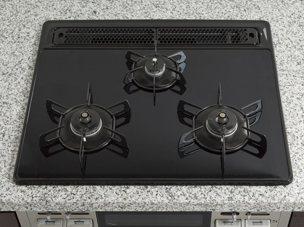 Kitchen.  [Glass top stove] Of glass top three-necked stove. Easy to clean because the boil over can also wipe quick and people.