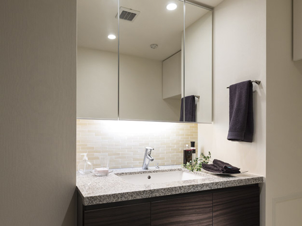 Bathing-wash room.  [Bathroom vanity] Vanity of water plugs, Adopted Hansgrohe Co. faucet. Vanity stuck to the functionality and stylish design.