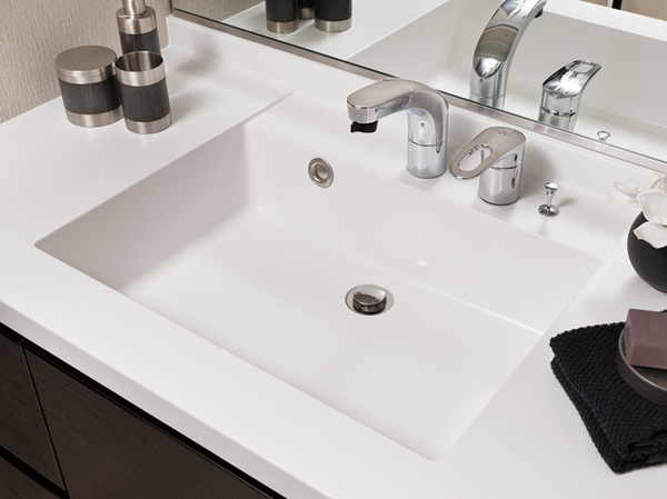 Bathing-wash room.  [Bowl-integrated artificial marble counter] Spacious easy-to-use counter of depth, Is easy to clean because it is seamless bowl-integrated.