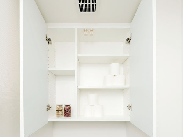 Toilet.  [Cupboard hanging in the toilet] The company than the traditional hanging cupboard slightly larger size, 12 roll worth of toilet paper, It can be stored remains of when I bought.