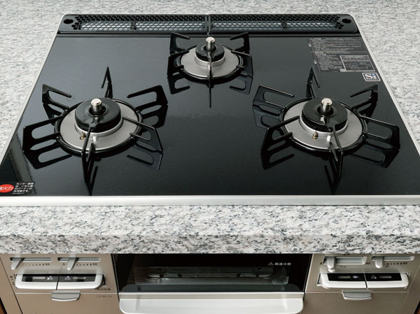 Kitchen.  [Pearl Crystal top stove] The top is a plate that was a special coating to the hard enamel. Dirt has become resistant to shock easily fall.