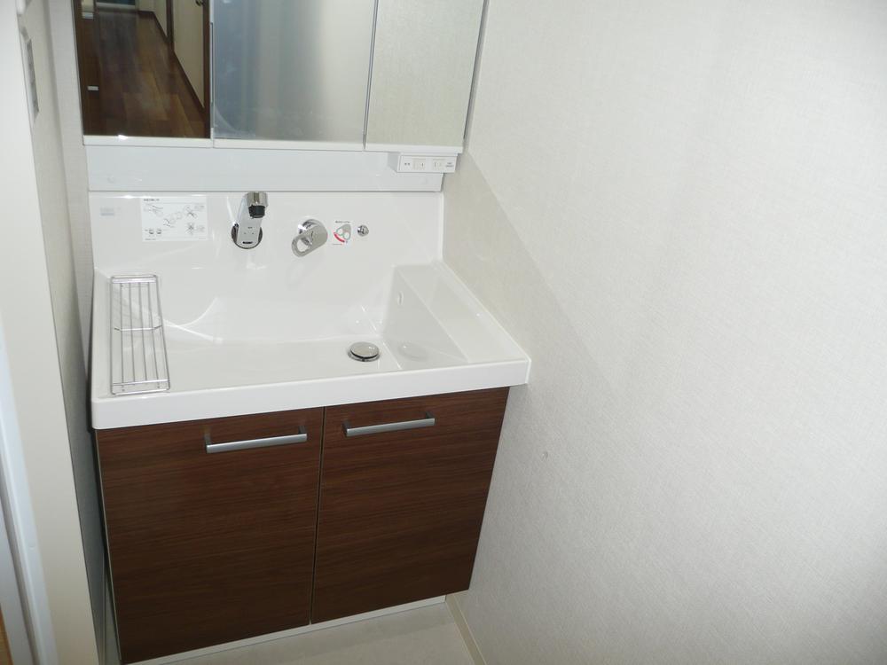 Wash basin, toilet. Bathroom vanity