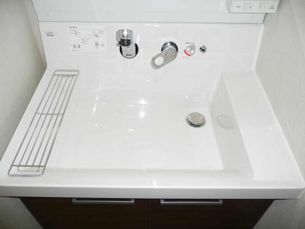 Wash basin, toilet. Bathroom vanity