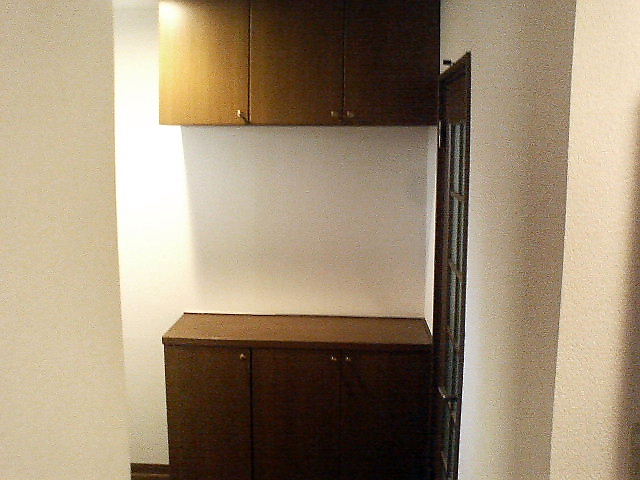 Entrance. Big shoes cloak