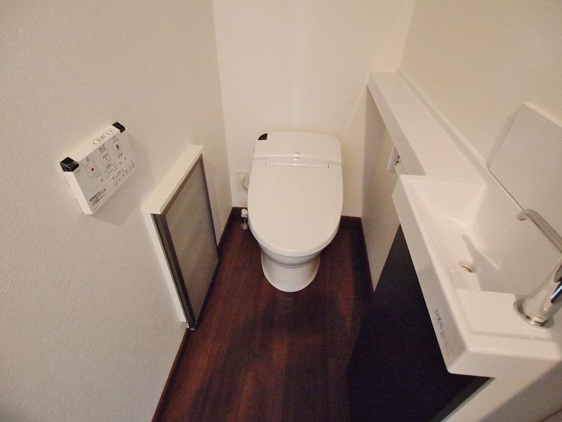 Toilet. - With hand-washing counter toilet - [C Building]