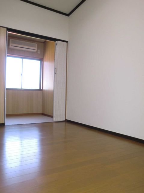 Living and room. A light and airy is the room.