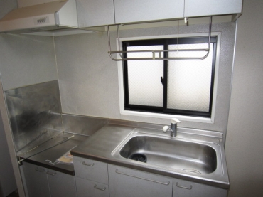 Kitchen. Small windows that allow the light to the large kitchen space in the two-necked gas