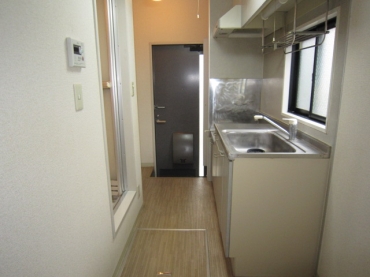 Kitchen. There is a kitchen space in between from the entrance of the room!