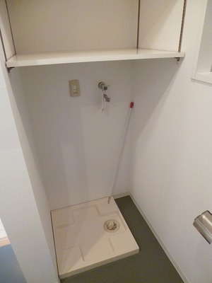 Other Equipment. Washing machine in the room