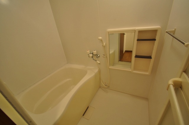 Bath. Same property, It is a photograph of another room.