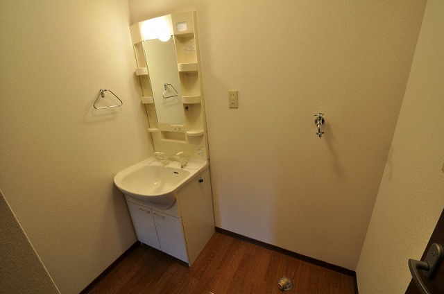 Washroom. Same property, It is a photograph of another room.