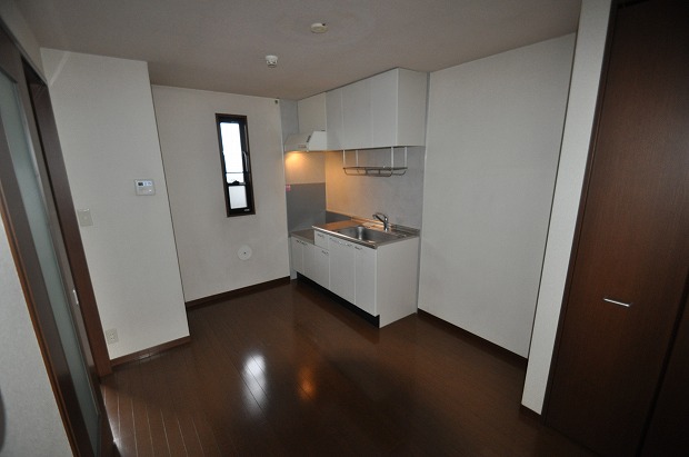 Kitchen. Same property, It is a photograph of another room.