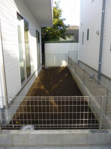 Other. There is a large garden on the south side.