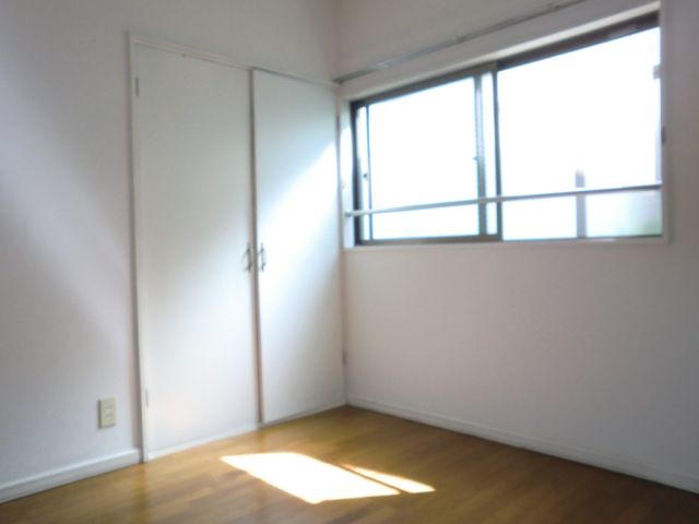 Living and room. It contains the light of day. Sunny.