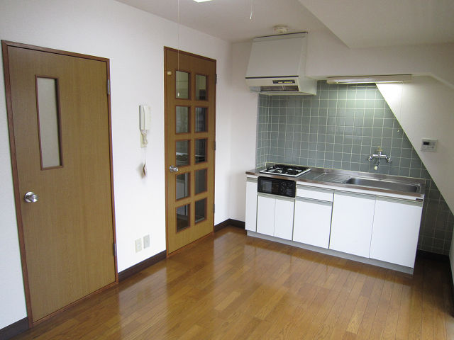 Living and room. It is a photograph of another room