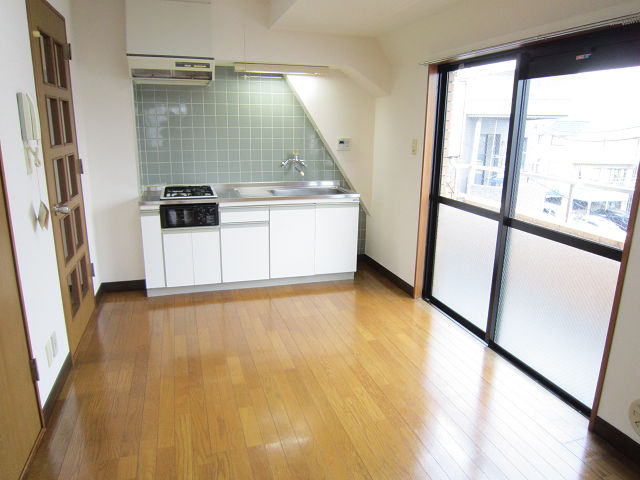 Living and room. It is a photograph of another room