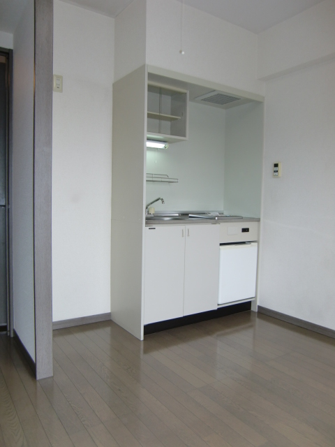 Living and room. Flooring there is a case of carpet.