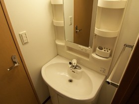 Washroom. Separate reference photograph basin space