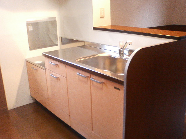 Kitchen. Also convenient to see how the room because it is counter kitchen.