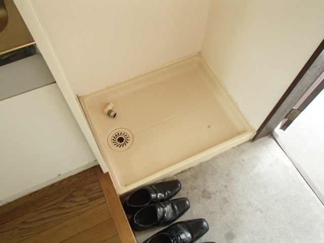 Other Equipment. Washing machine in the room